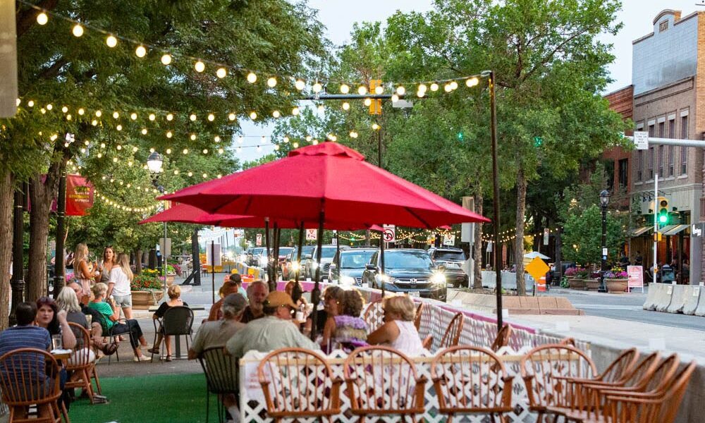Downtown Longmont restaurant with many families eating.
